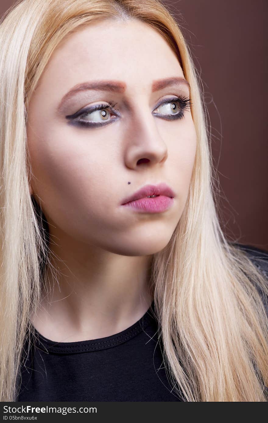 Close up portrait of a beautiful rock girl