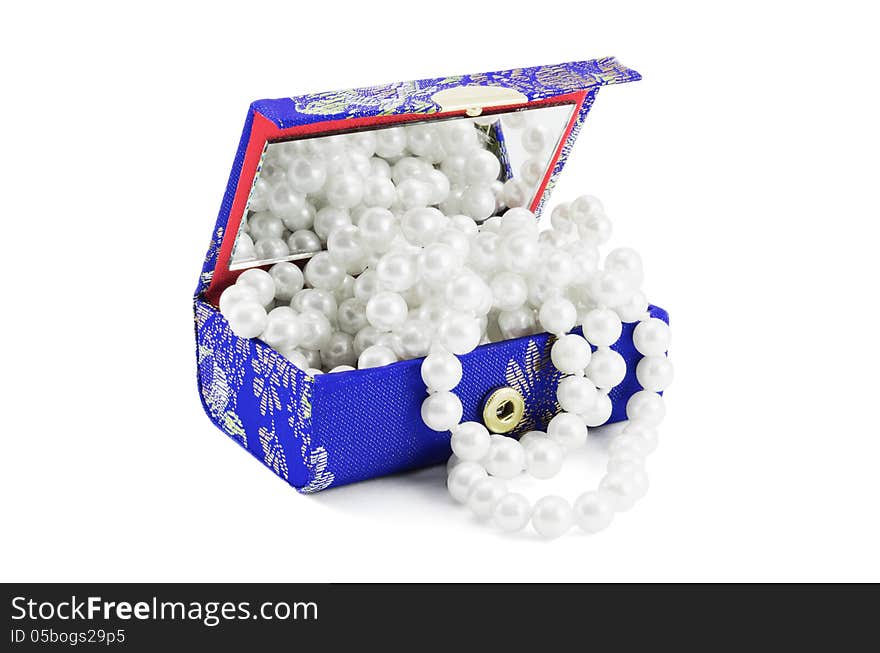 Small Casket with a necklace from pearls on a white background. Small Casket with a necklace from pearls on a white background