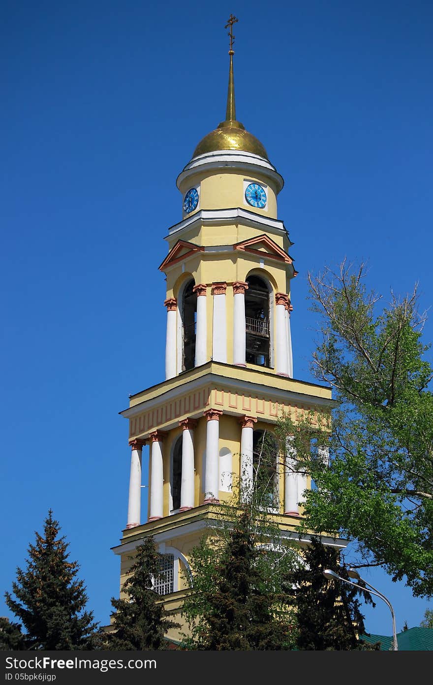 The upper part of the church building with a dome, ringing bells of different sizes. The upper part of the church building with a dome, ringing bells of different sizes.