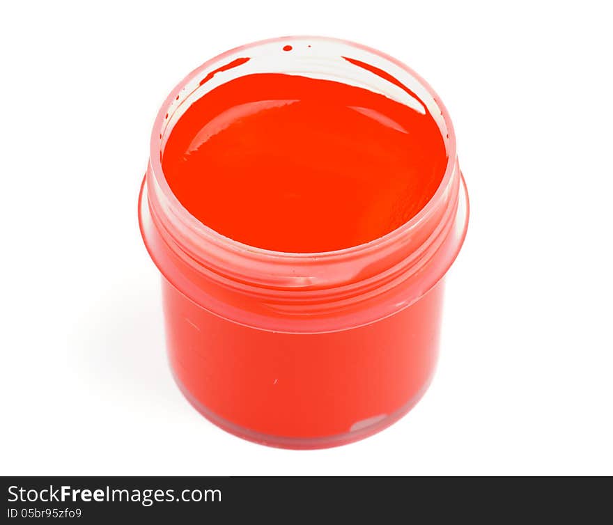 Container with Red Gouache Paint isolated on white background. Top View