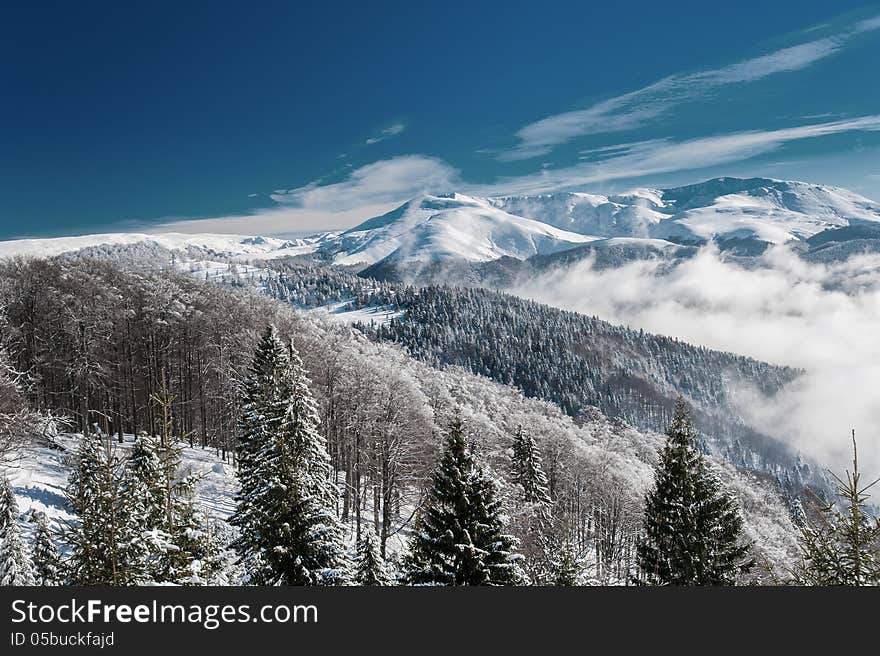 Winter mountain scenery and snow covered peaks in Europe