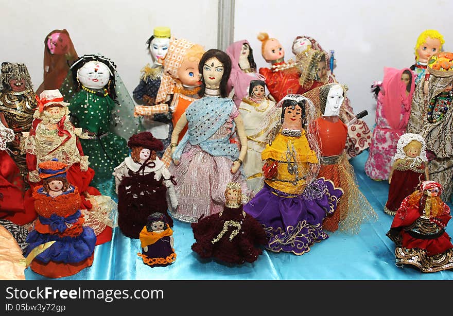 Showcase with collection of beautiful and colorful dolls, India