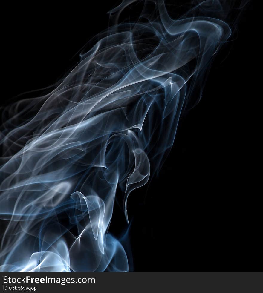 Light blue smoke isolated on black