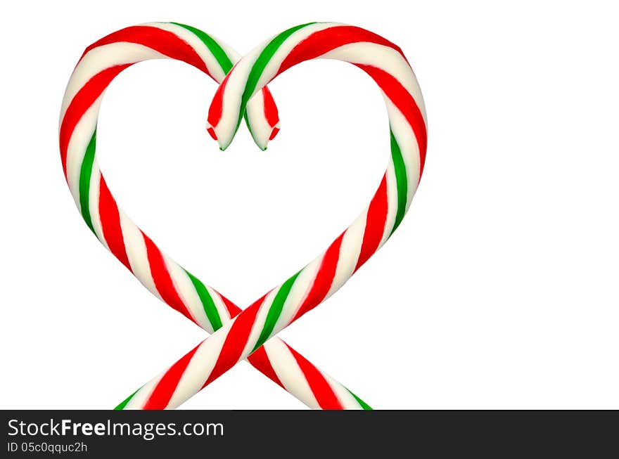 Heart of sugar sticks isolated on a white background