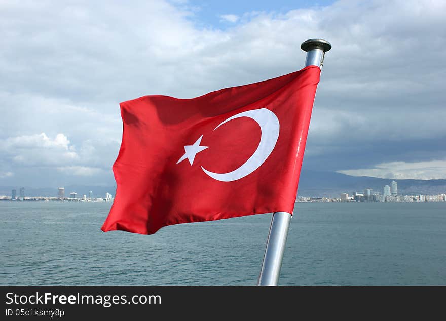 Turkey flag on Izmir bay background