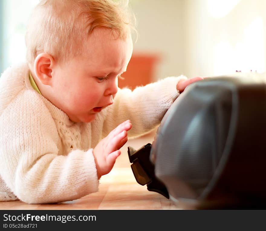 Beautiful little girl playing with a CD player. Beautiful little girl playing with a CD player