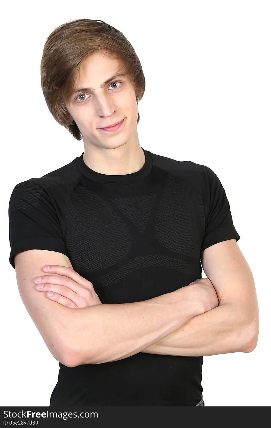 Portrait of young Caucasian man smiling on white background.