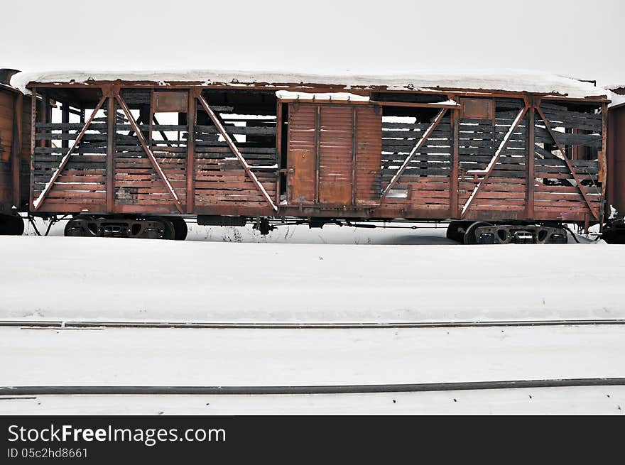 Burnt car of the train on white snow. Burnt car of the train on white snow.