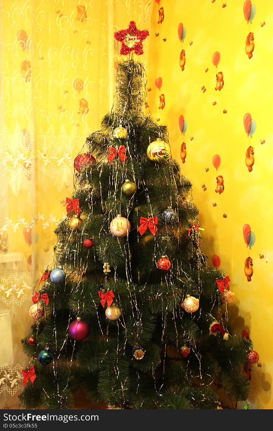 Harmonous and dressed up New Year s fur-tree