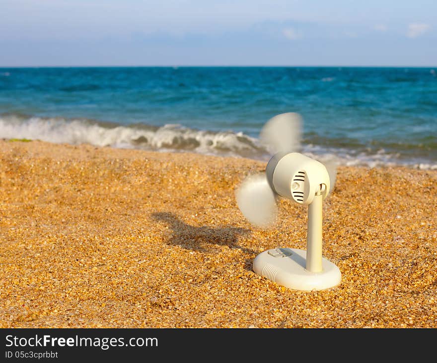 A fan on the beach. A fan on the beach