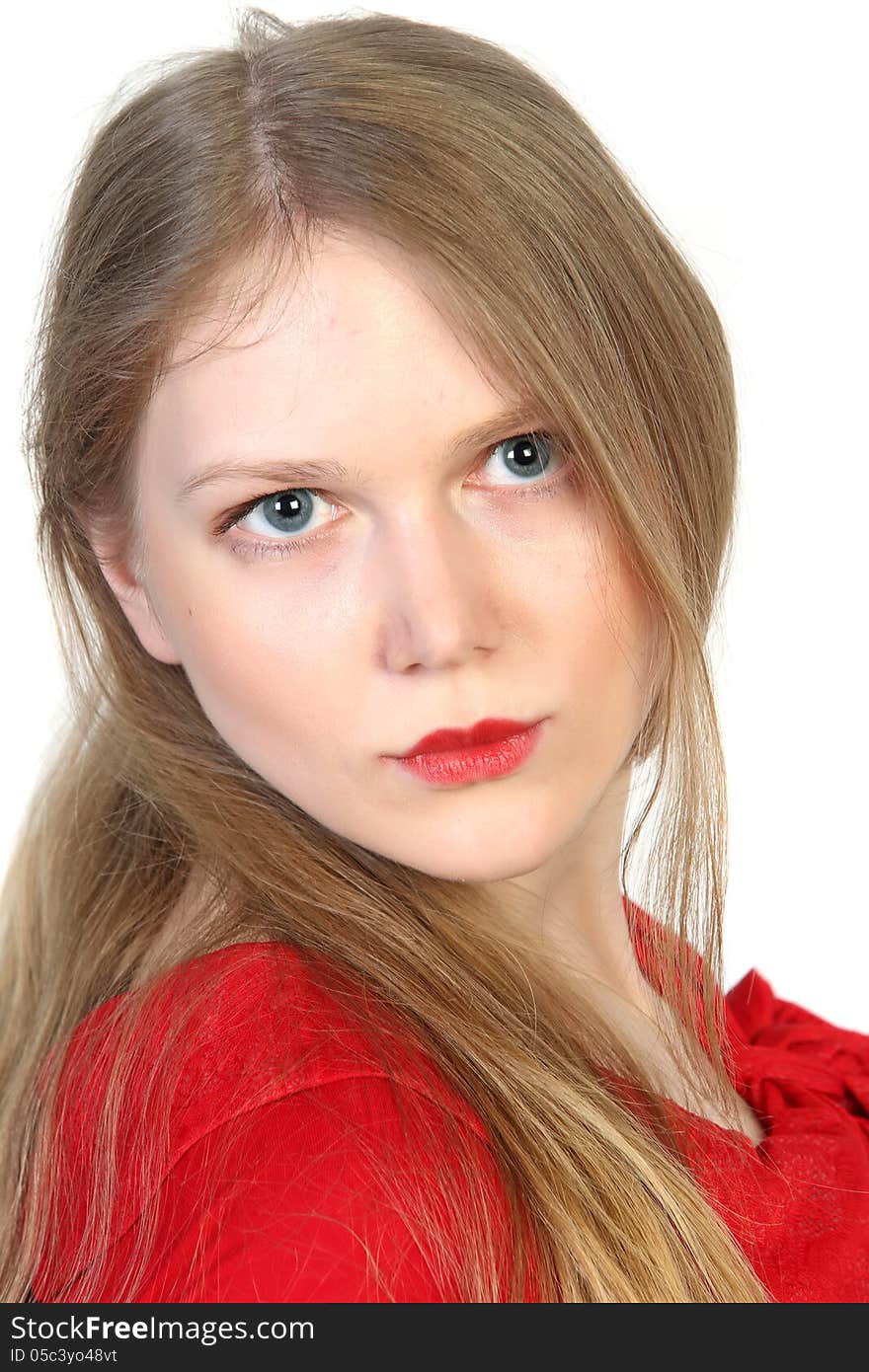 Close-up studio portrait of young beautiful woman in red on white background. Close-up studio portrait of young beautiful woman in red on white background