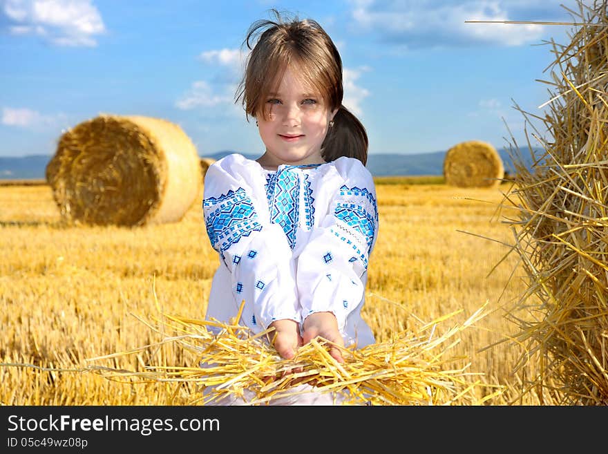 Small Rural Girl On Harvest Field