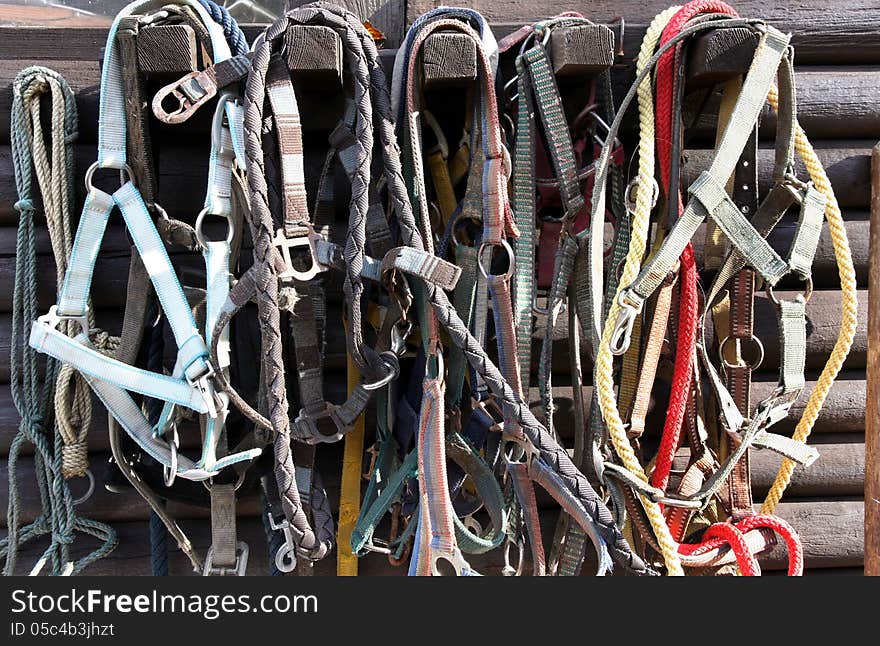 Details of diversity used horse reins, background the log cabin