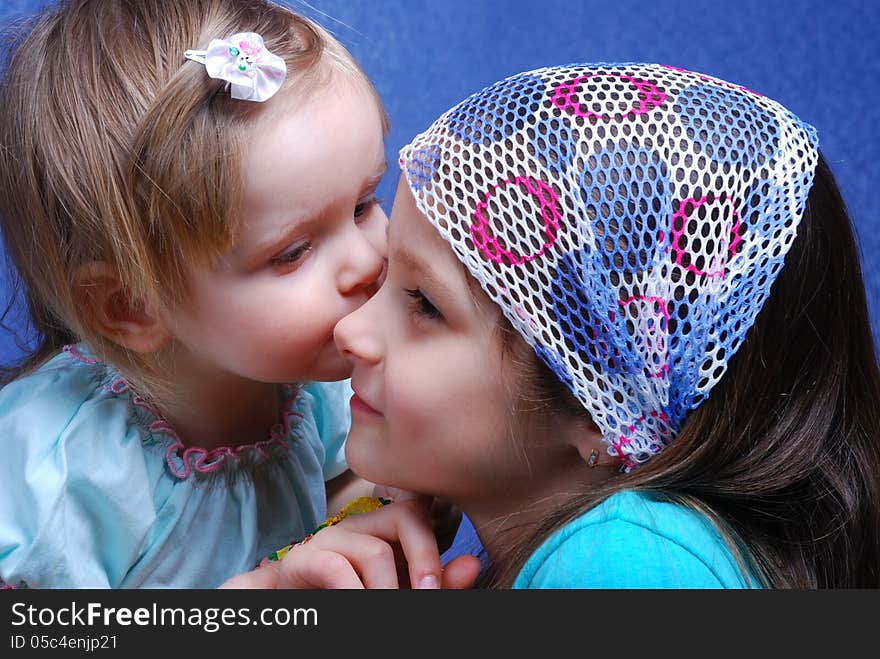 Two sisters are dressed up as fairies.