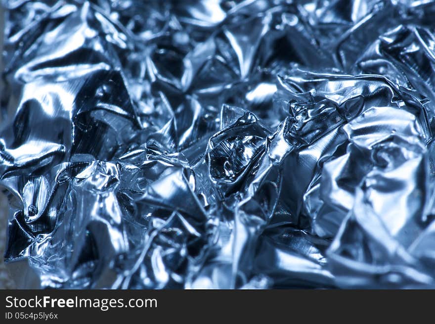 Macro shot of crumpled tin foil. Macro shot of crumpled tin foil.