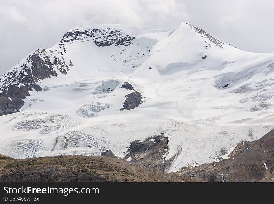 Canadian Rocky Mountain hills near the Athabasca Glacier Park. Canadian Rocky Mountain hills near the Athabasca Glacier Park