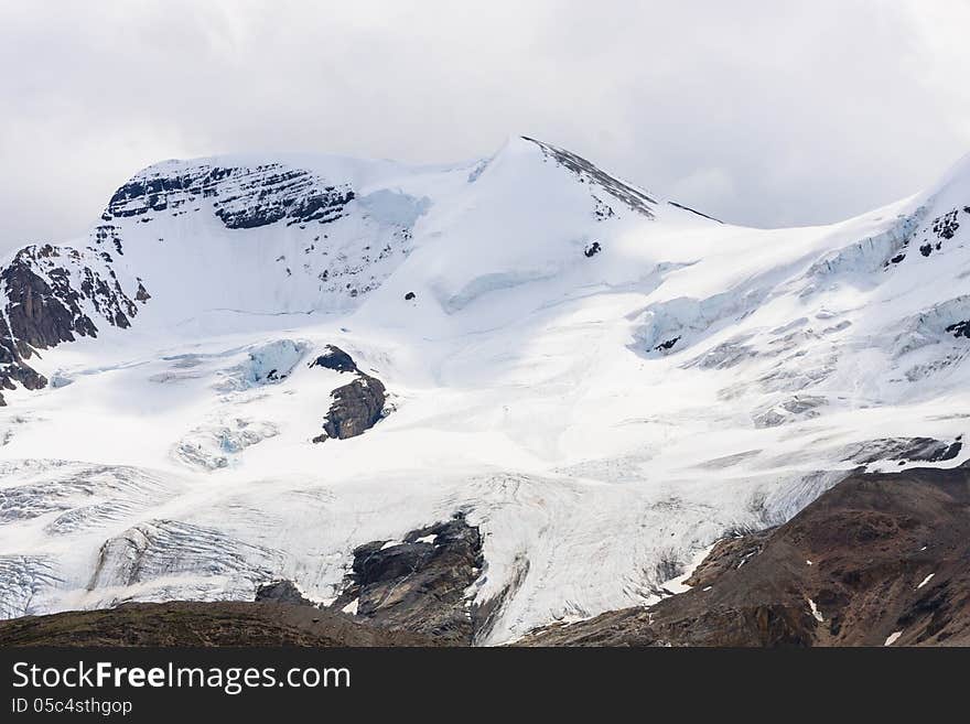 Snowed Mountain Athabasca Glacier Park in the Canandian Rocky Mountain. Snowed Mountain Athabasca Glacier Park in the Canandian Rocky Mountain