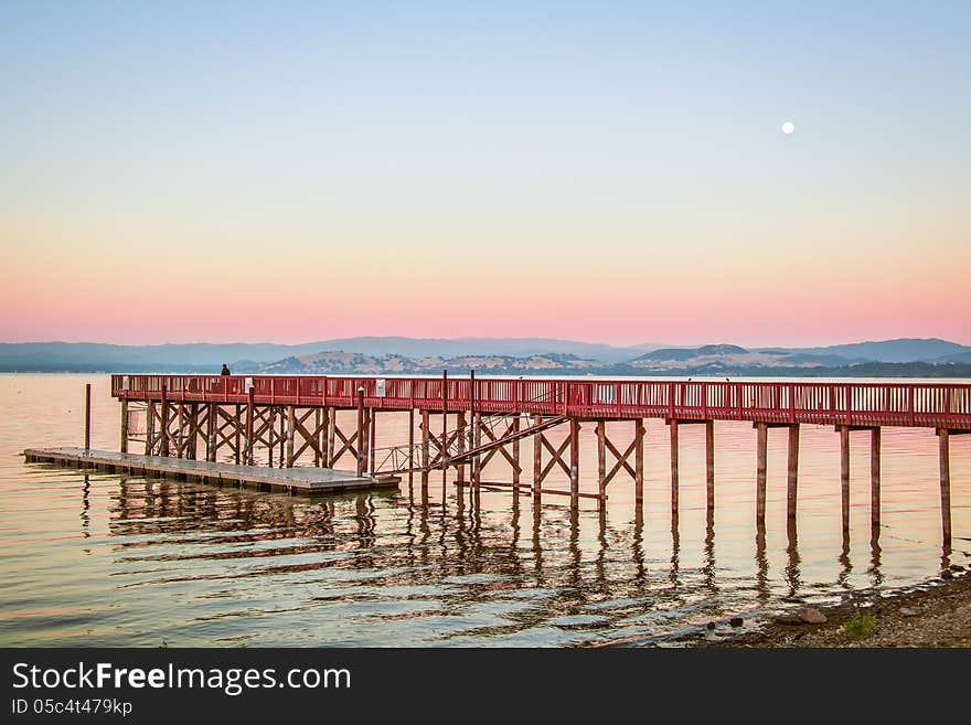 Sunrise at a Clear Lake Pier. Sunrise at a Clear Lake Pier