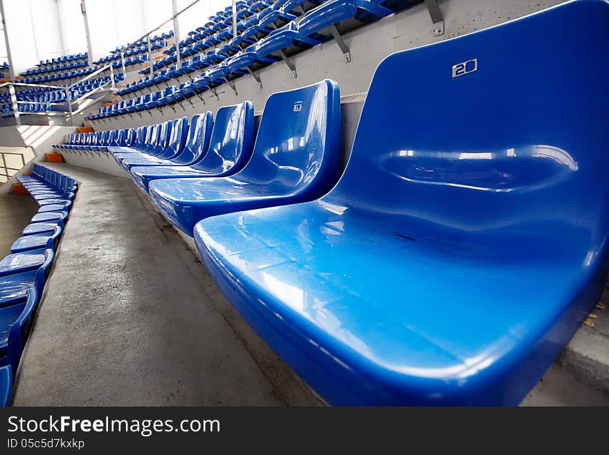 Blue seats in the sports hall