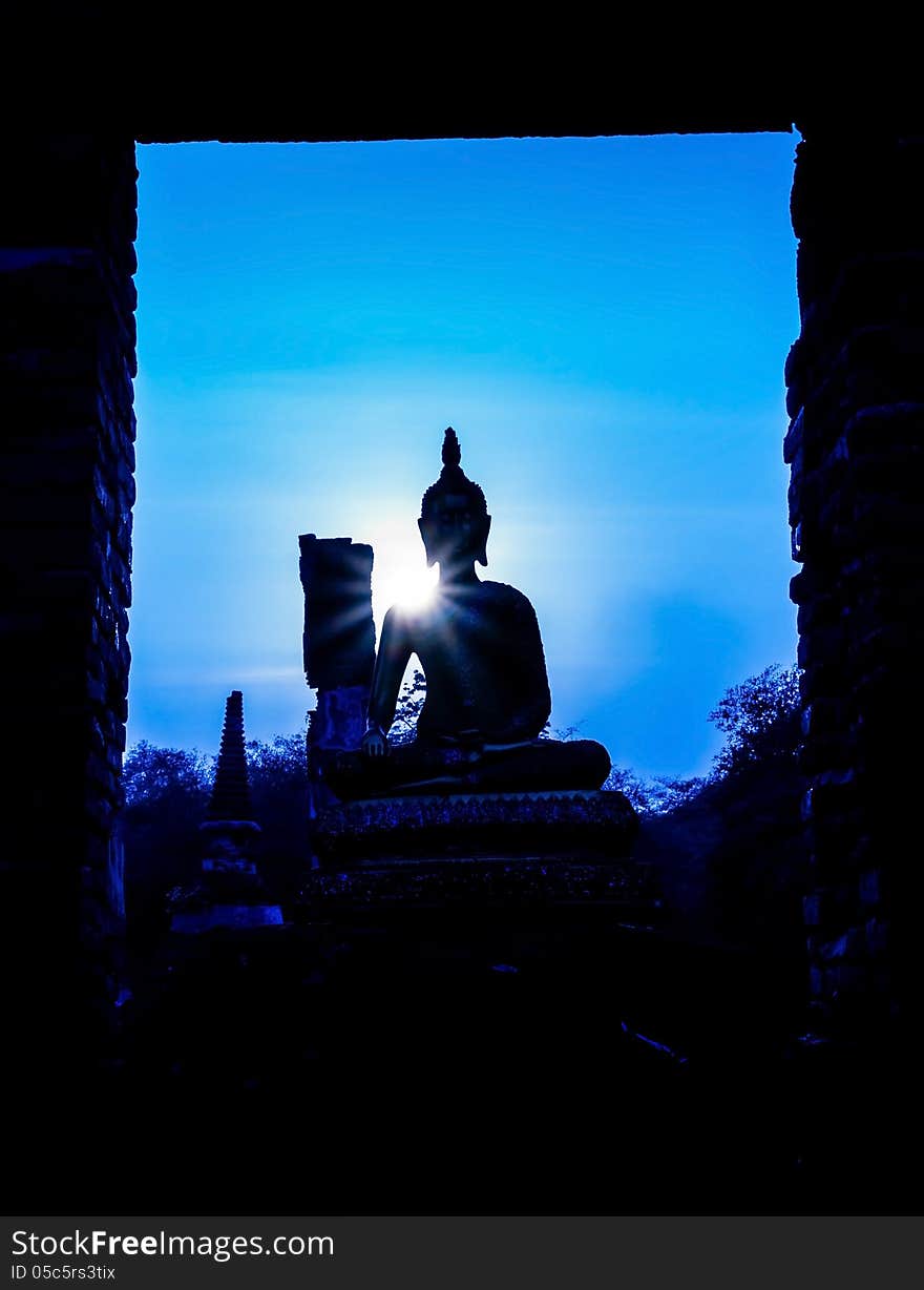 Buddha and pagoda after sunset, wat Phra sri sanphet temple