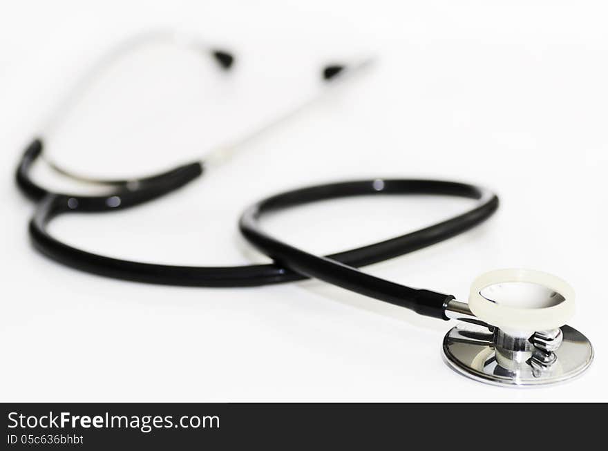 Medical instrument, stethoscope on white background