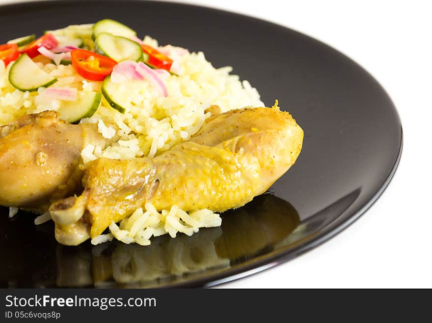 Kgawhmk chicken on a black plate