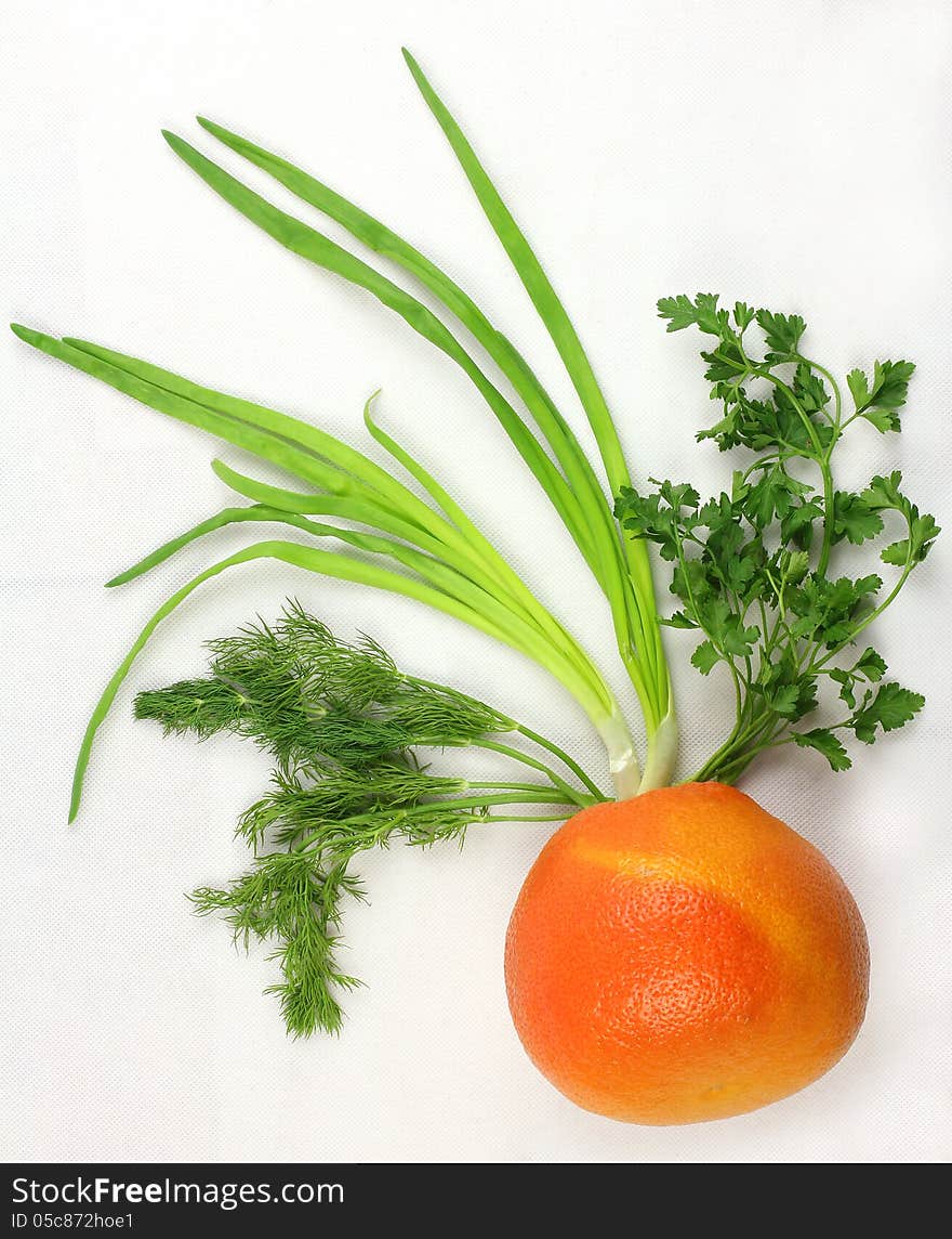 Unusual plant, grapefruit with onions, parsley and dill