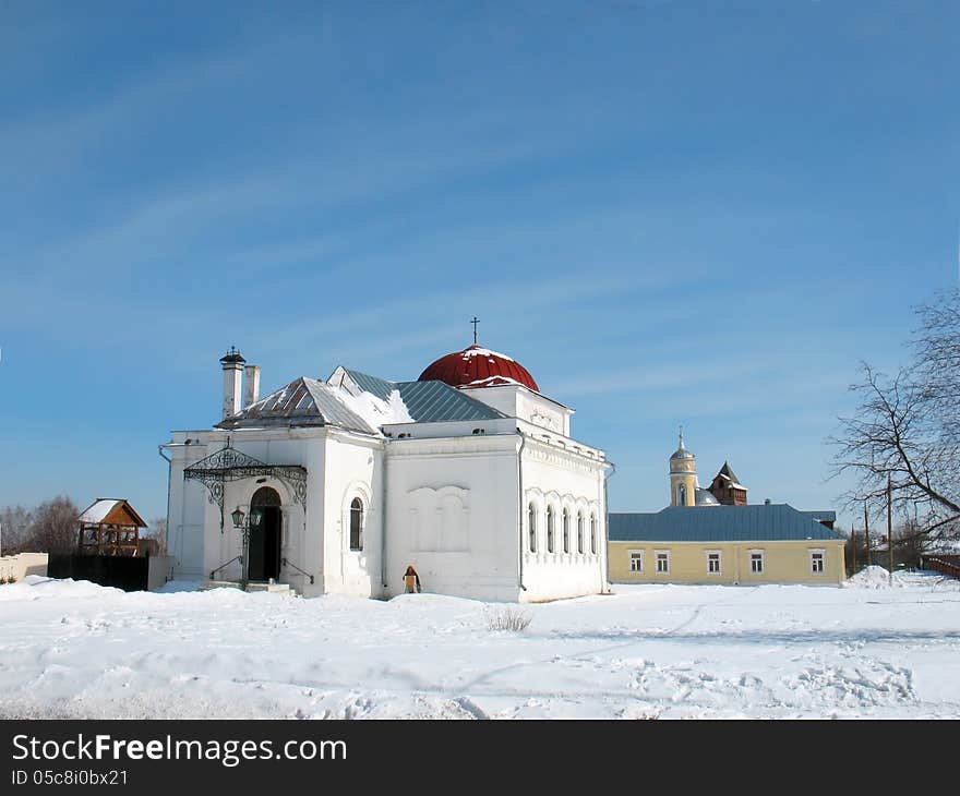 Village street with view of the church. Village street with view of the church