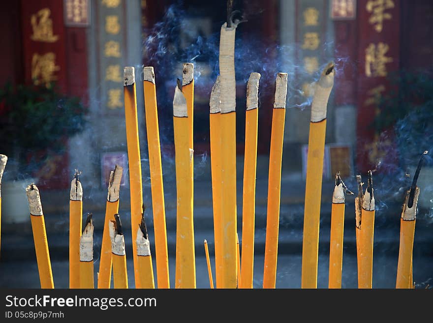 Buddhist prayer joss sticks in a chinese temple