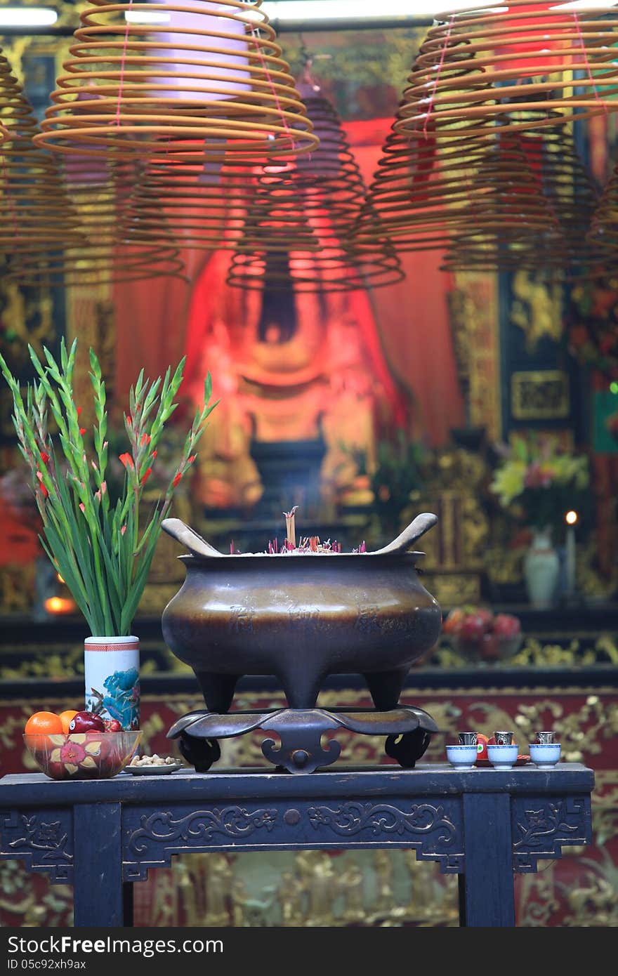 Buddhist prayer joss sticks in a chinese temple