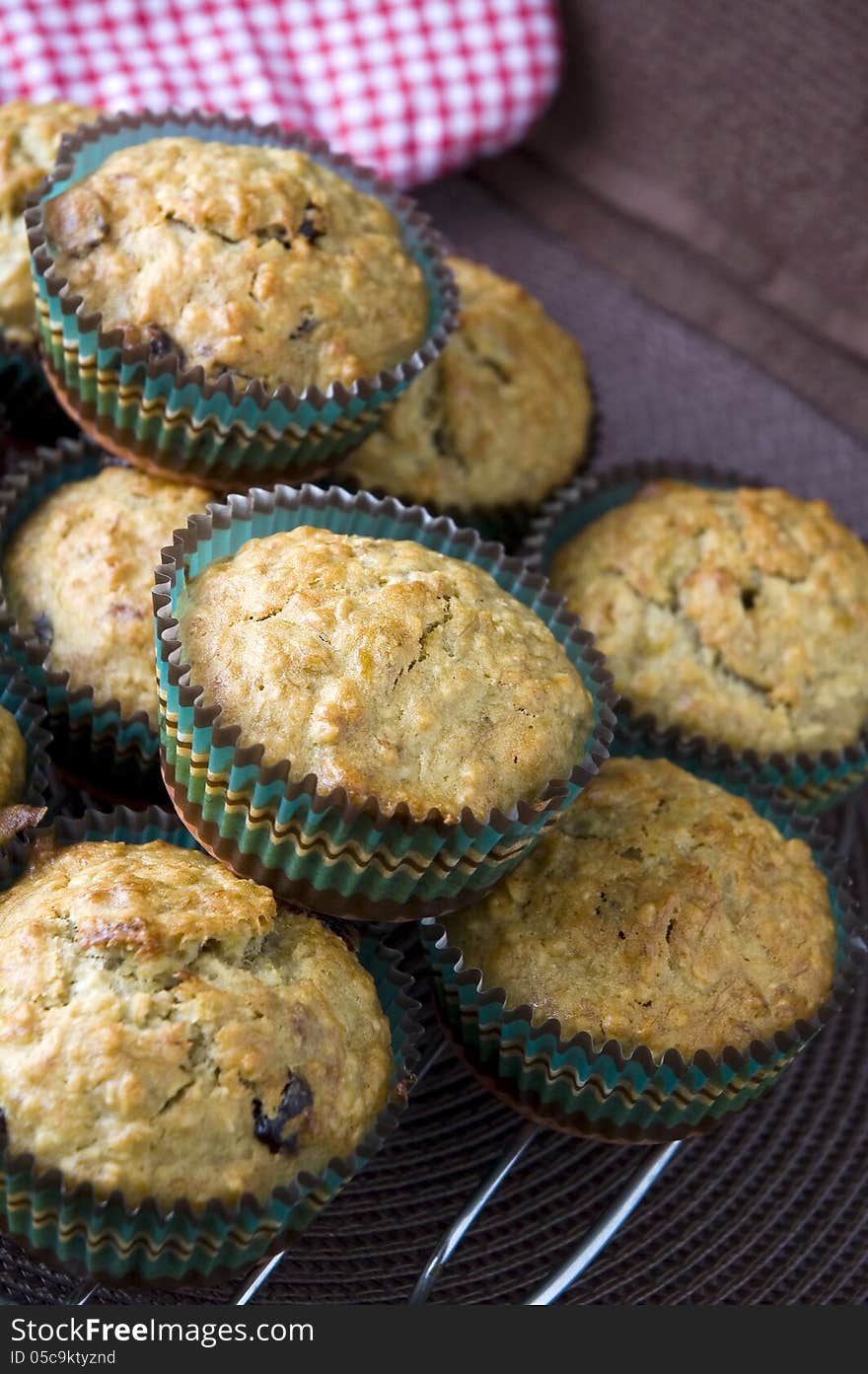 Pile of banana cupcakes on cooling rack