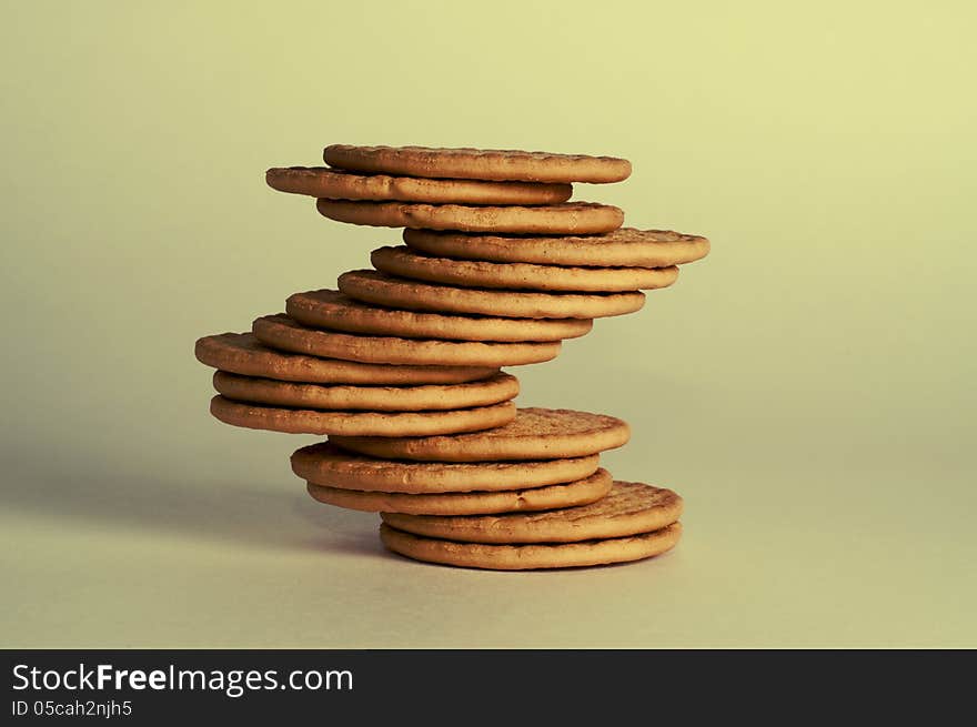 Pile of cookies on a beige background