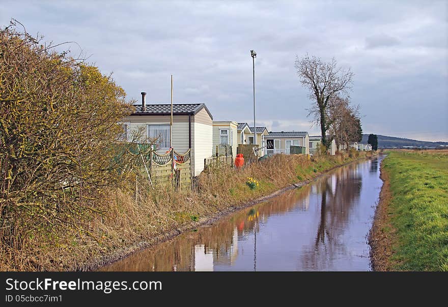 Caravans along tow path canal