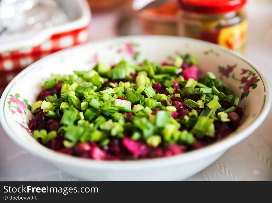 Beetroot salad with spring onions on top