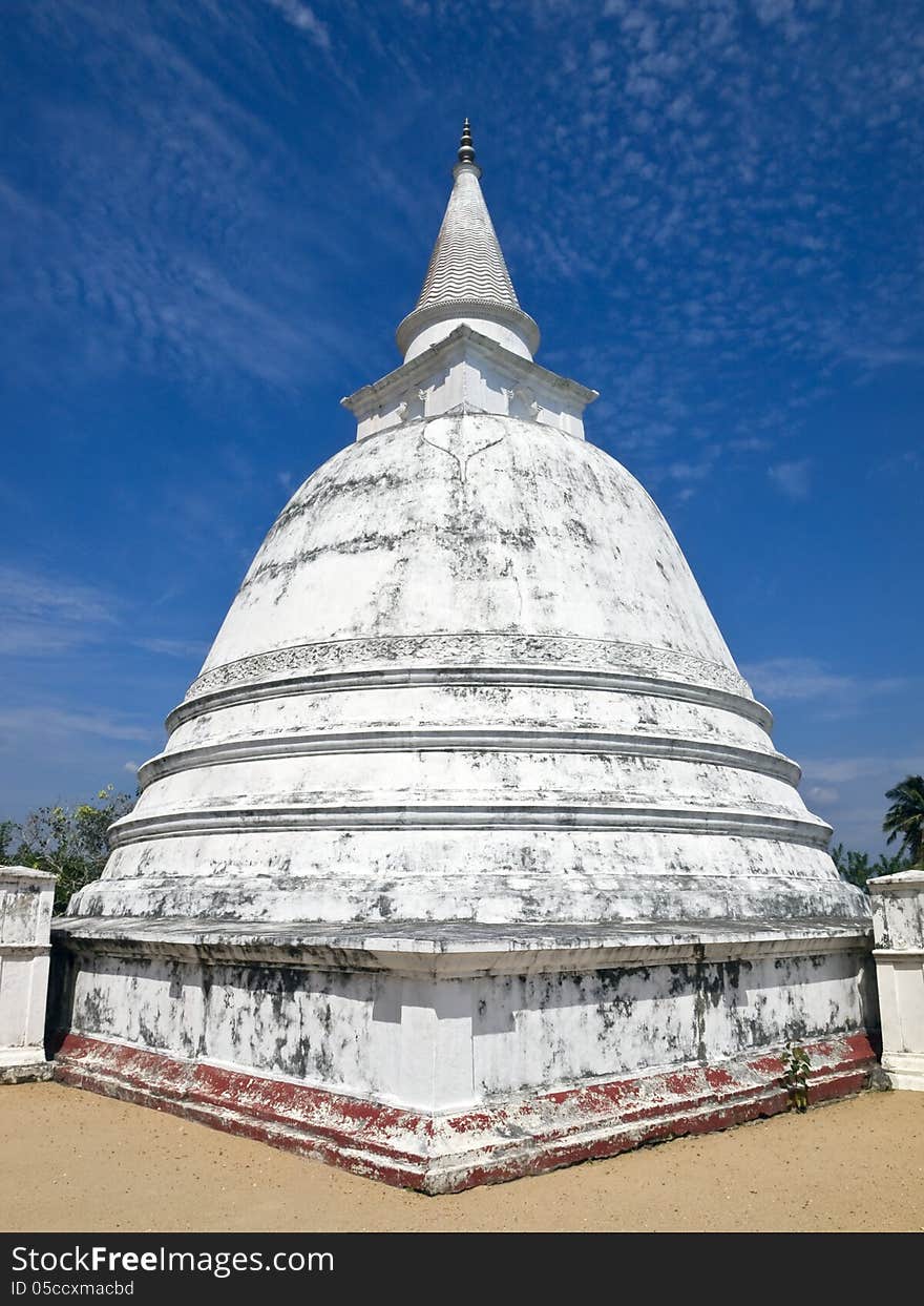 Stupa with gold Buddha statue inside