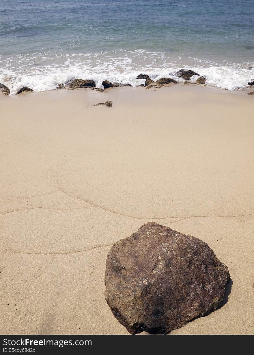 Large stone lying on the beach. Large stone lying on the beach