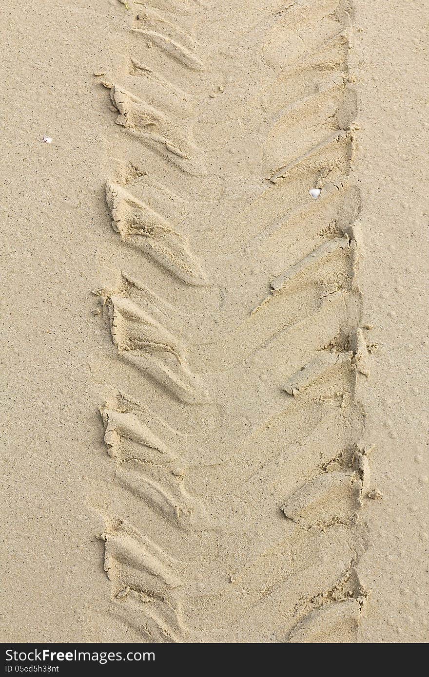 Tread pattern of truck tire in soft sand. Tread pattern of truck tire in soft sand