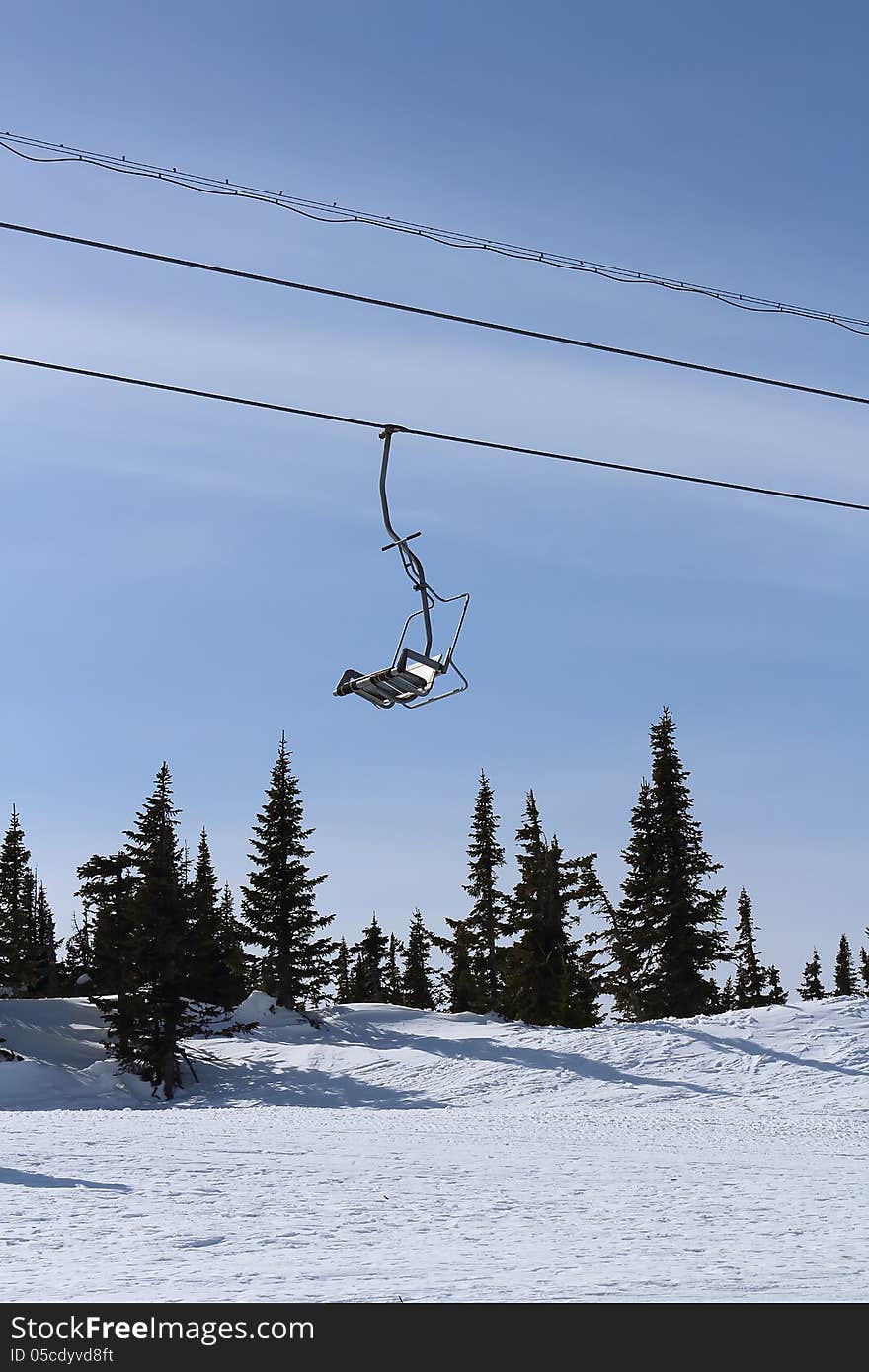 Chairlift in the mountains in ski resort