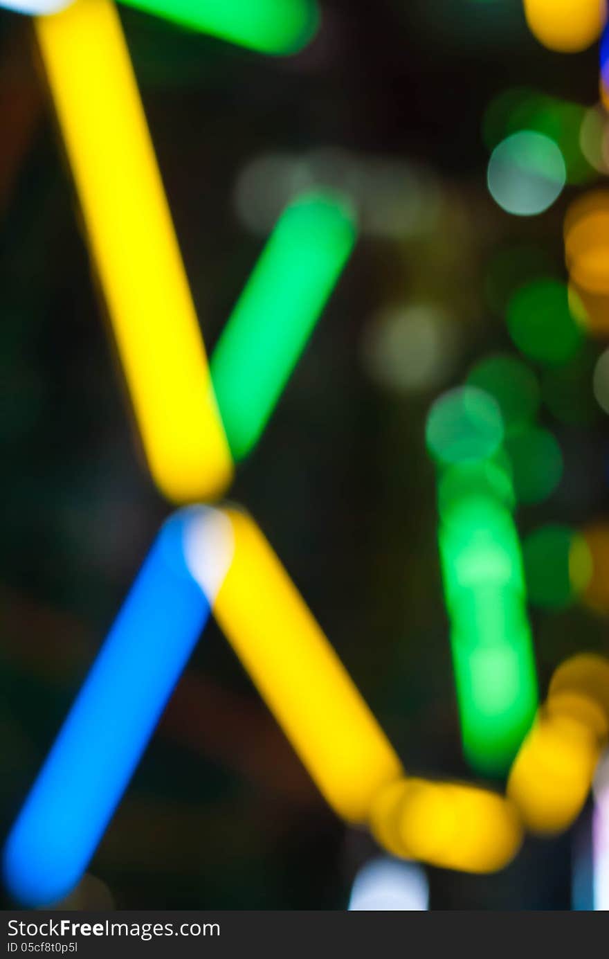 Ferris Wheel at Night with colorful bokeh effect pattern