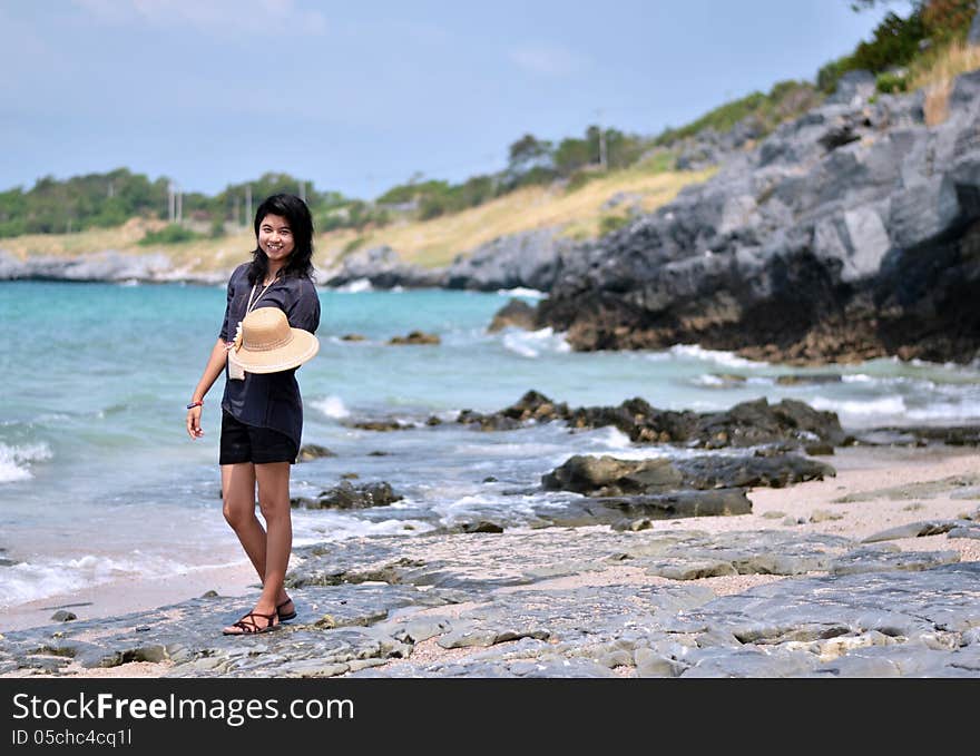 Young woman on beach summer holiday