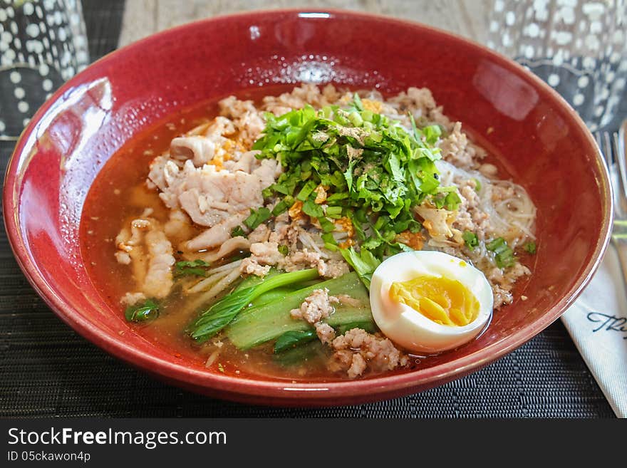 Thai noodle soup with pork and egg