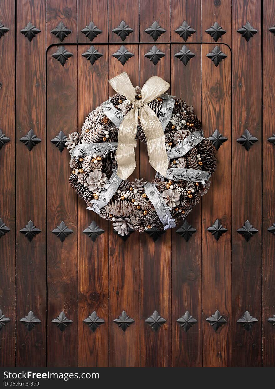 Christmas wreath on wooden door