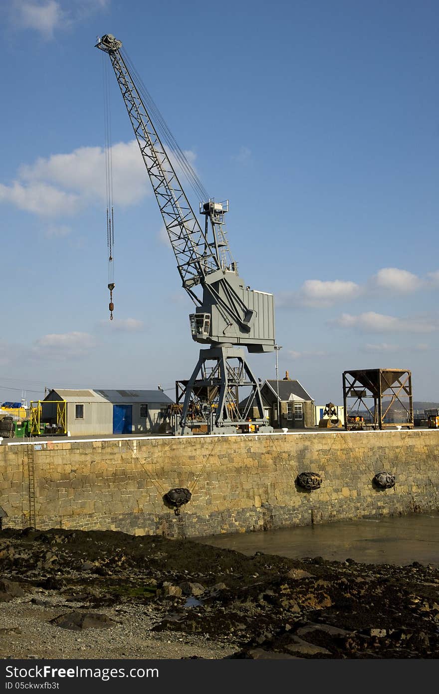 Dockyard Crane On A Jetty. Guernsey