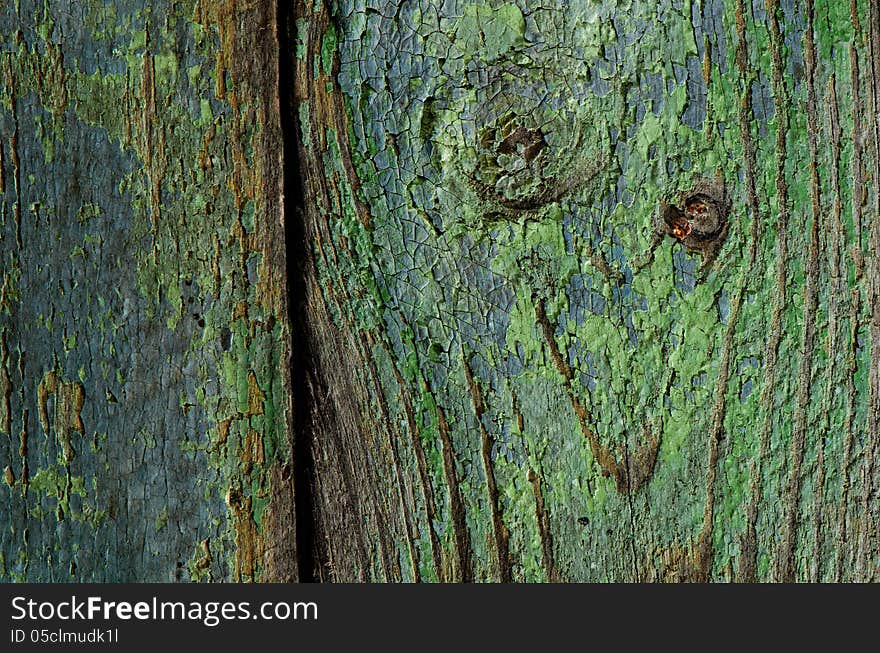 Texture of old paint on a wooden board. Texture of old paint on a wooden board