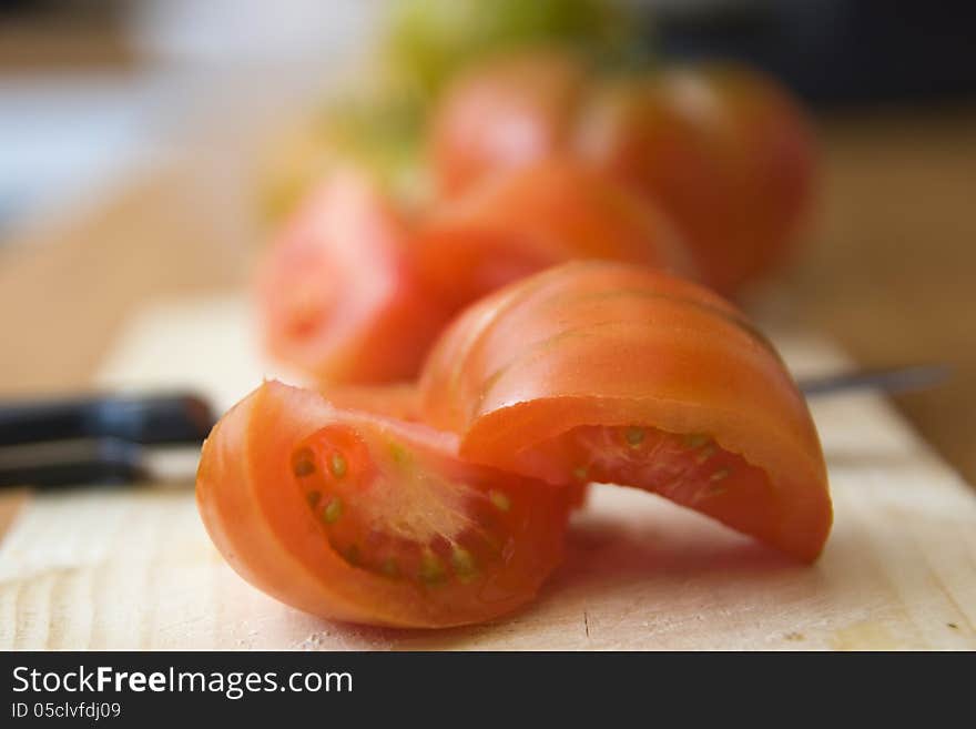 Parties tomatoes in the kitchen