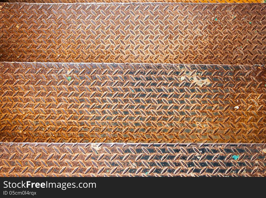 Three metal textured rusty yellow old stage. Three metal textured rusty yellow old stage