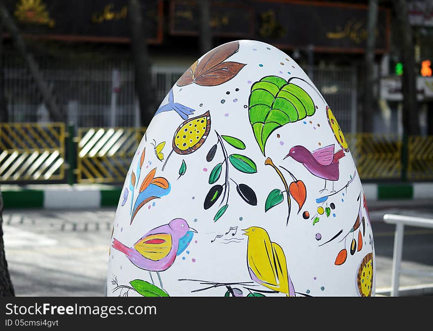 Big painted plaster egg at street, one of the symbols of Persian new year’s arrival