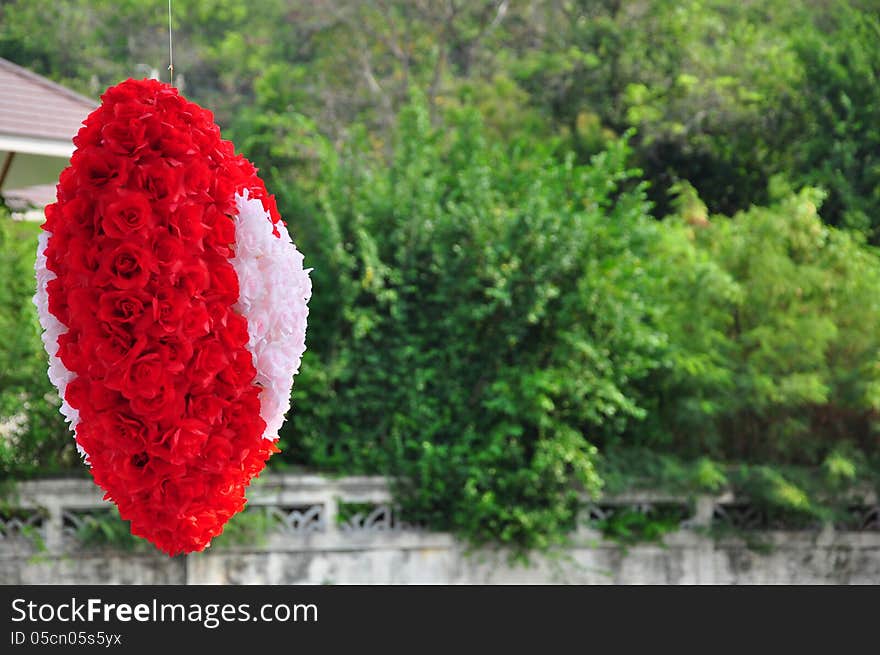 Mobile heart Paper Hanging in front of the house