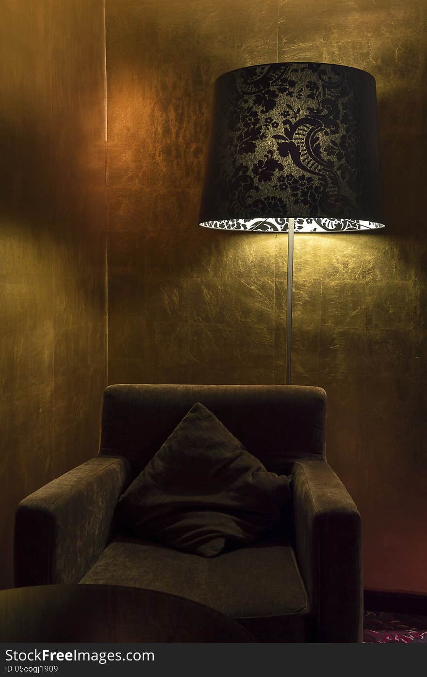 Elegant Armchair and Lamp in Golden Room. Elegant Armchair and Lamp in Golden Room