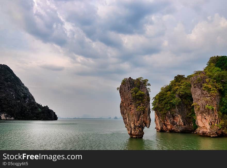 James Bond island ocean view with cloudy sky in Phang Nga bay, A